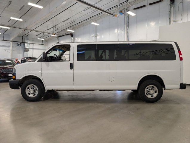 driver's side view of 2022 Chevrolet Express Passenger for sale in Fort Collins