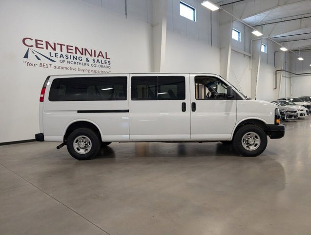 passenger side view of 2022 Chevrolet Express Passenger for sale in Fort Collins