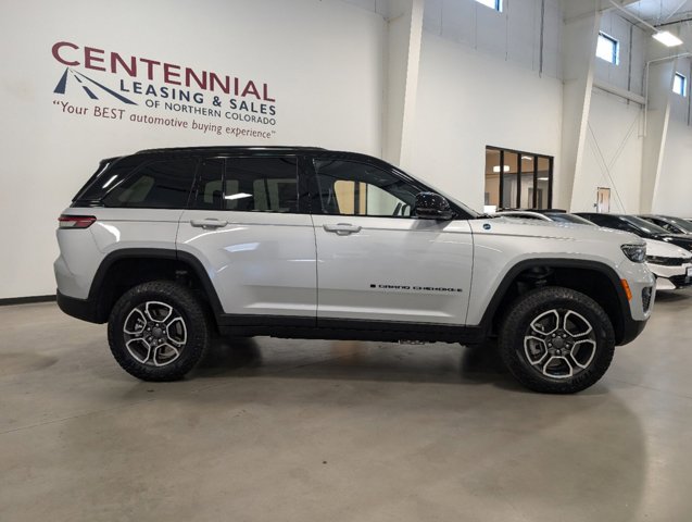 passenger side view of 2024 Jeep Grand Cherokee 4xe for sale in Fort Collins