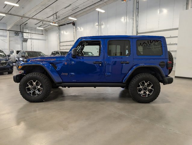 driver's side view of 2019 Jeep Wrangler Unlimited for sale in Fort Collins