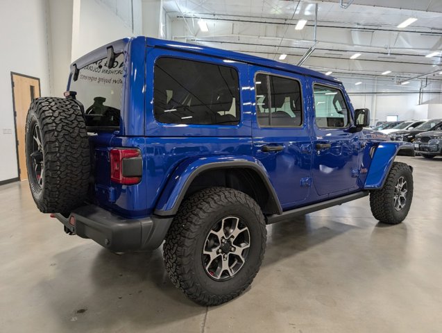 rear passenger side view of 2019 Jeep Wrangler Unlimited for sale in Fort Collins