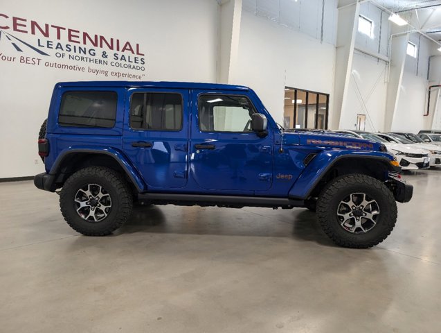 passenger side view of 2019 Jeep Wrangler Unlimited for sale in Fort Collins